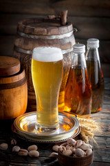 Light beer in a glass on the table