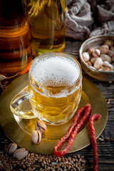Light beer in a glass on the table