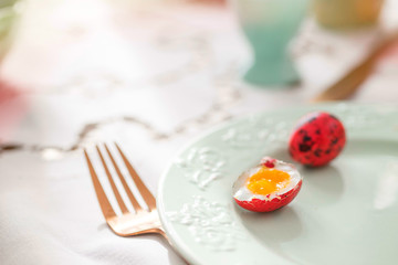 Easter breakfast in Poland. Soft boiled dyed quail eggs.