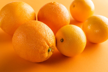 fresh oranges on paper background