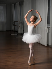 Fototapeta na wymiar Little girl classic ballet dancer
