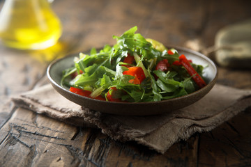 Healthy arugula salad with vegetables