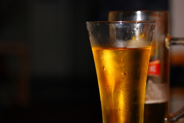 misted full glass with cold beer