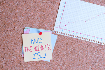Conceptual hand writing showing And The Winner Is. Concept meaning announcing who got first place...