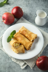 Crepes filled with apple and cinnamon