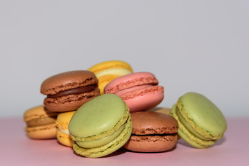 Colorful macaroons cake, sweet macaroon on white table background, food background