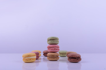 Colorful macaroons cake, sweet macaroon on white table background, food background