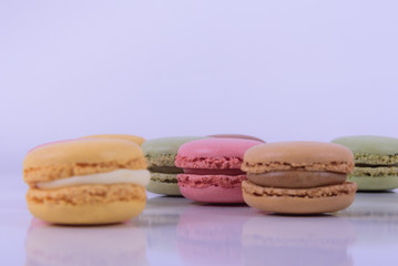 Colorful macaroons cake, sweet macaroon on white table background, food background