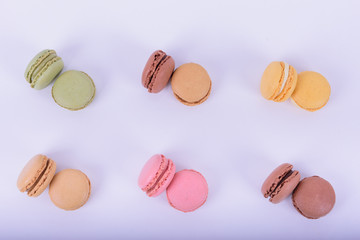 Colorful macaroons cake, sweet macaroon on white table background, food background