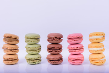 Colorful macaroons cake, sweet macaroon on white table background, food background