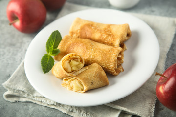 Crepes filled with apple and cinnamon