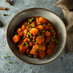 Homemade pumpkin curry with green pea