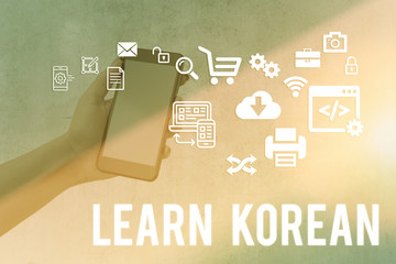 Writing note showing Learn Korean. Business concept for get knowledge or skill in speaking and...