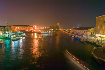 Fototapeta na wymiar Venice's Grand Canal under a clear sky at night