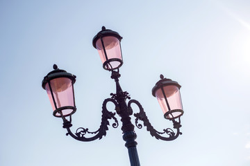 Fototapeta na wymiar Vintage lantern on sky background