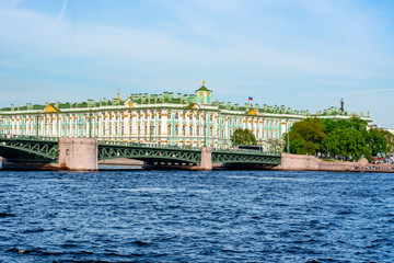 State Hermitage museum (WInter palace) and Palace bridge over Neva river, Saint Petersburg, Russia