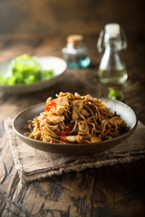 Homemade rice noodles with chicken and vegetables