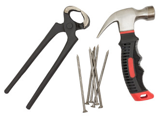Pliers hammer and nails, elevated view on white