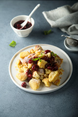 Traditional Austrian pancake dessert with cherry sauce