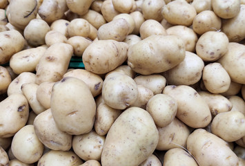 Potatoes (Solanum tuberosum) for sale in supermarket gondola
