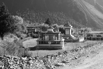 A Stupa and Temple with Many Prayer Wheels