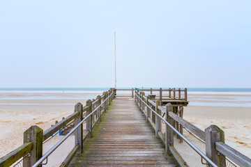 Wooden lookout facing the sea at the beach of Norddorf on the German North Sea island of Amrum