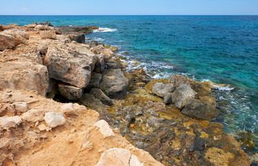 Fototapeta na wymiar The rocky shore of Cape Greco. Cyprus