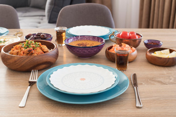 Iftar Food Table at Home. Evening Meal For Ramadan. Arabic Cuisine. Middle Eastern Traditional Lunch. Assorted Of Egyptian Oriental Dishes. Blue Table Setting, Dining Table For Special Holiday