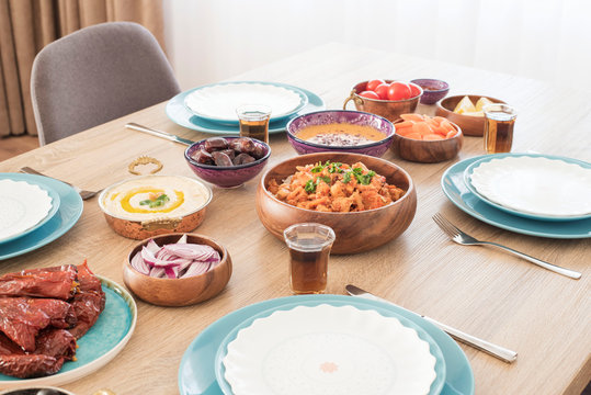 Iftar Food Table At Home. Evening Meal For Ramadan. Arabic Cuisine. Middle Eastern Traditional Lunch. Assorted Of Egyptian Oriental Dishes. Blue Table Setting, Dining Table For Special Holiday