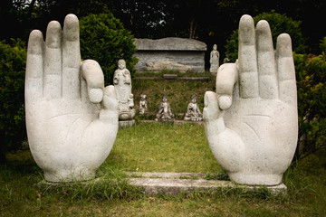 statue of hands in the temple