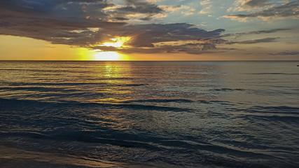 Fototapeta na wymiar Stunning sunset in Negril, Jamaica. Bright colors