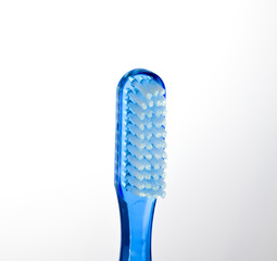 close-up view of blue toothbrush