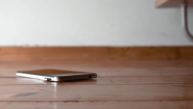 Smartphones cellphone phone drop to the ground. Make the screen broken and damaged. accident insurance technology, repair and maintenance.