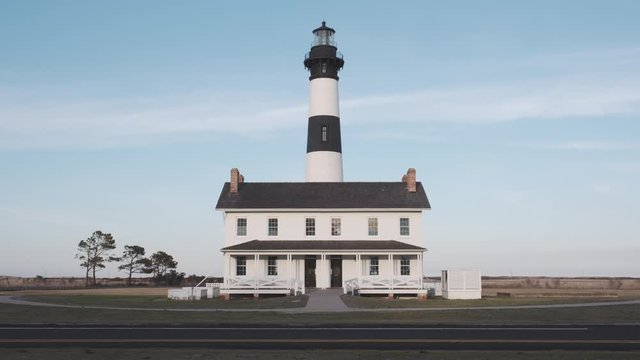 Historic Bodie Island Lighthouse in the Cape Hatteras National Seashore just after sunrise, Outer Banks, North Carolina, USA