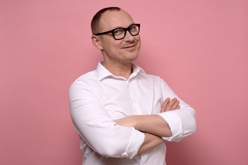 Caucasian man mature handsome man in glasses smiling.