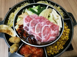 Noodle vegetables and pork in a pot. Korean style restaurant in the mall thai