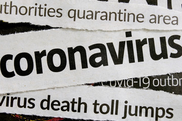 Novel coronavirus breaking news headline clippings from various newspapers reporting on the deadly disease, macro view. Concept for global coverage on severity of Covid-19 or 2019-ncov virus. - obrazy, fototapety, plakaty