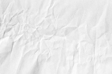Obraz na płótnie Canvas Crumpled white paper background texture