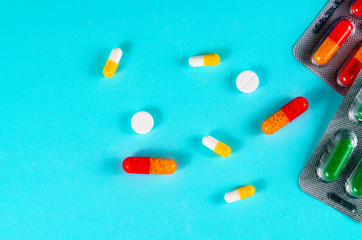 pills and pills on a blue background