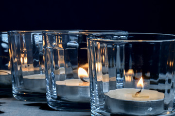 candles lit in votive