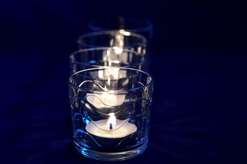 candles lit in votive