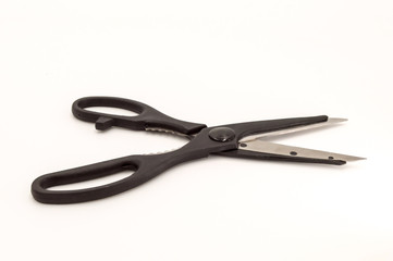 Kitchen scissor with a black handle,