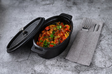 Traditional azu dish in a hot pan