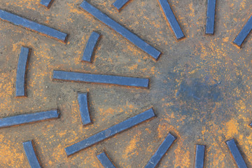 Manhole cover on the street background