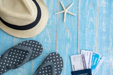 Foto auf Acrylglas Beach accessories on blue wooden table. Summer concept © supat