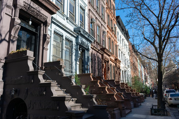 A Row of Old Colorful Brownstone Townhouses on the Upper West Side of New York City