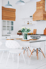 Slow living lifestyle concept. Kitchen interior and table setting.