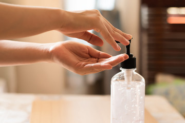 Asian people using alcohol,using alcohol gel clean wash hand sanitizer anti virus bacteria.