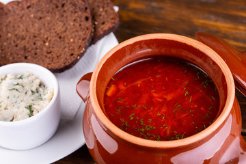 Borsch with greens, sour cream and black bread