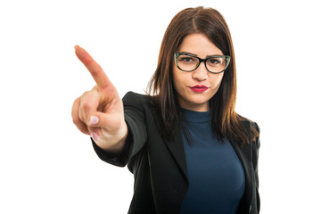 Portrait of young business girl wearing glasses showing denial gesture
